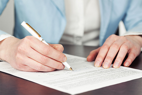 Woman filling out a form