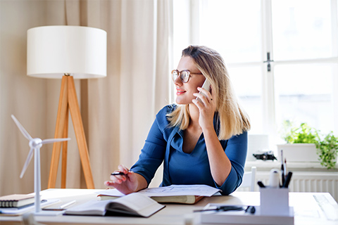 woman making an appointment for well-woman visit