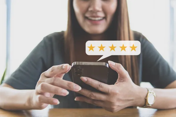 Woman giving a five star review